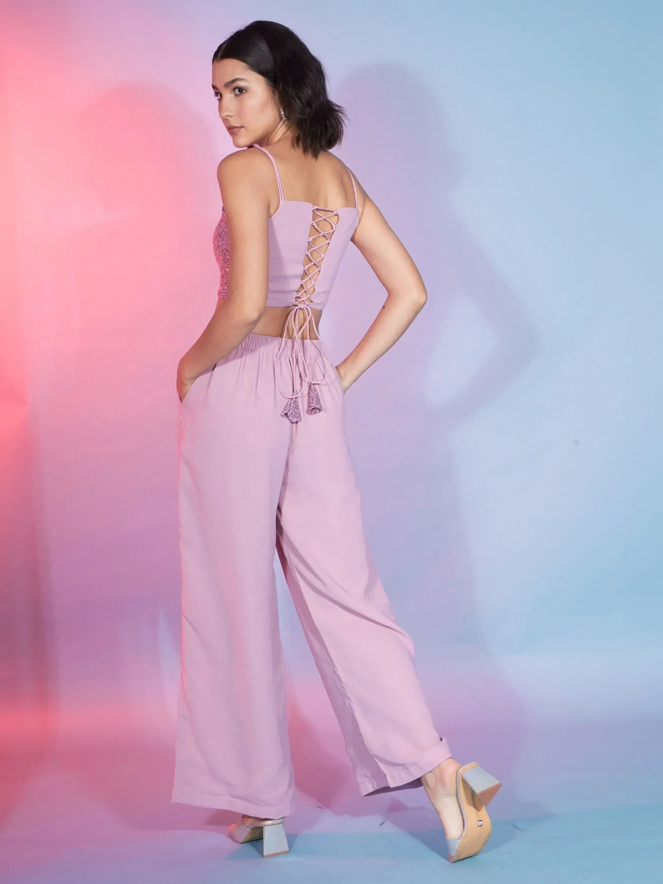 Lilac ethnic crop top with lace-up back and wide-leg pants, perfect for modern Indian wear