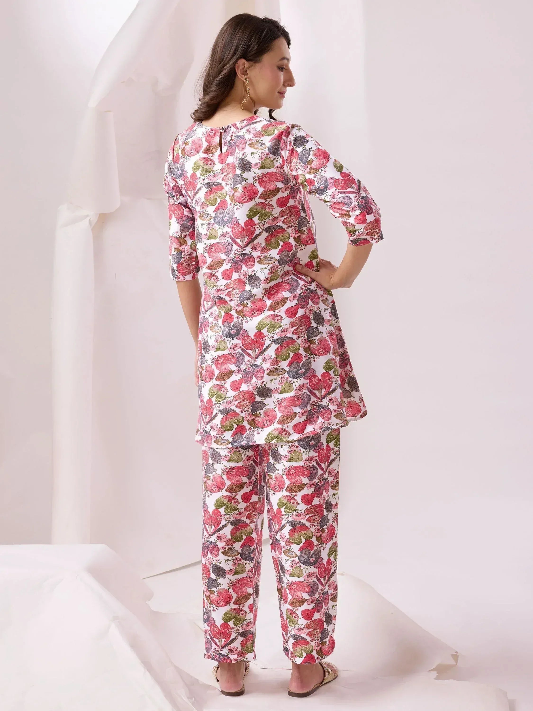 Floral print salwar kameez with pink and green botanical design, stylish ethnic wear for women