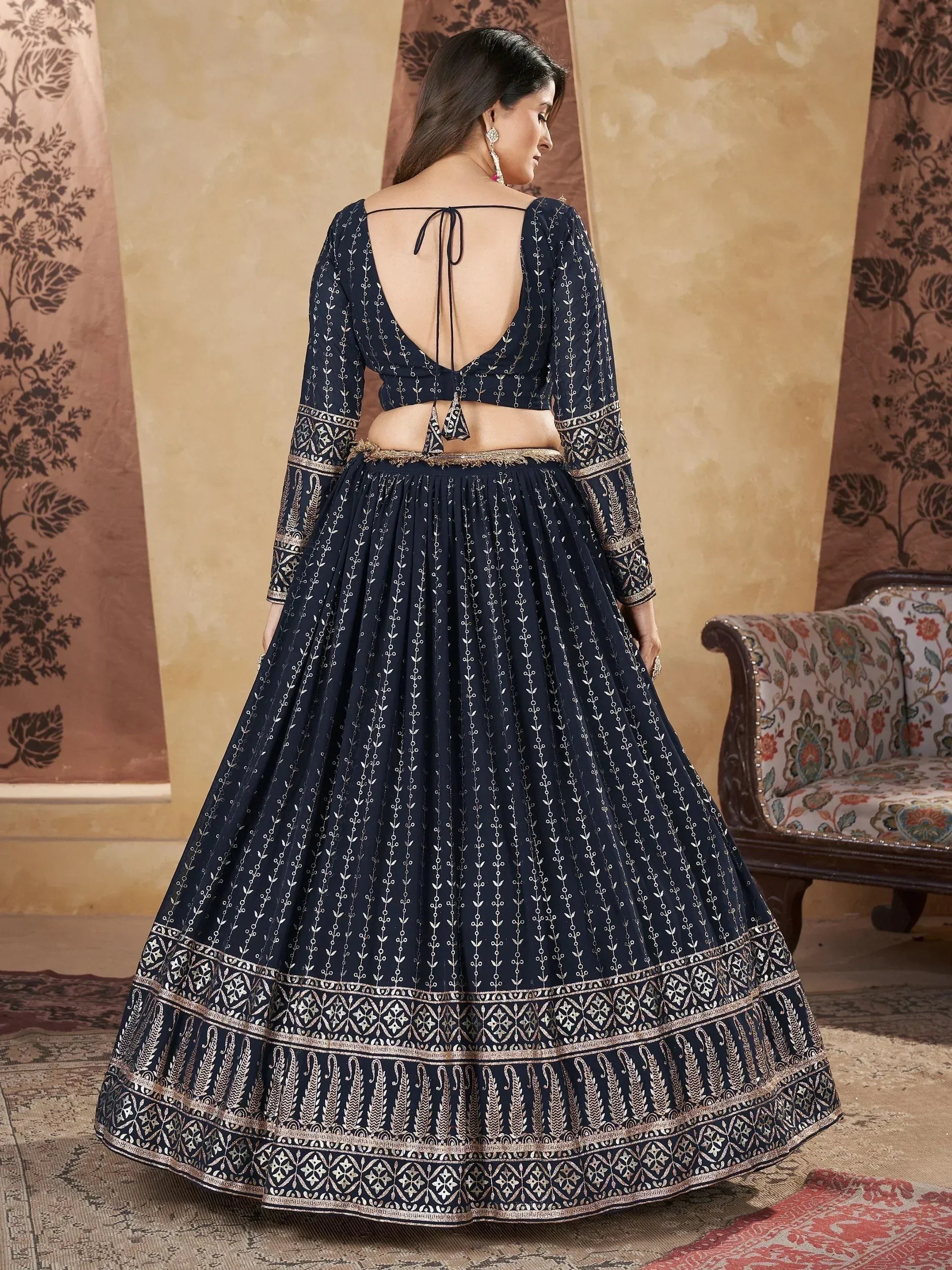 Navy blue designer lehenga choli with gold embroidery, back tie blouse, and flared skirt for ethnic wear