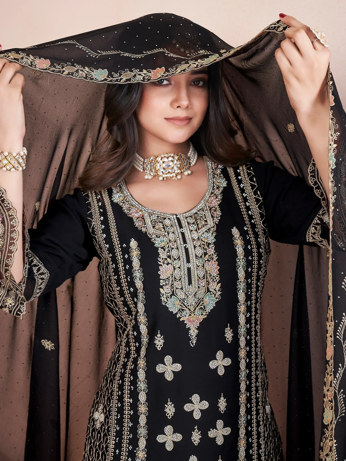 Black embroidered salwar kameez with floral dupatta, perfect for Indian ethnic wear occasions