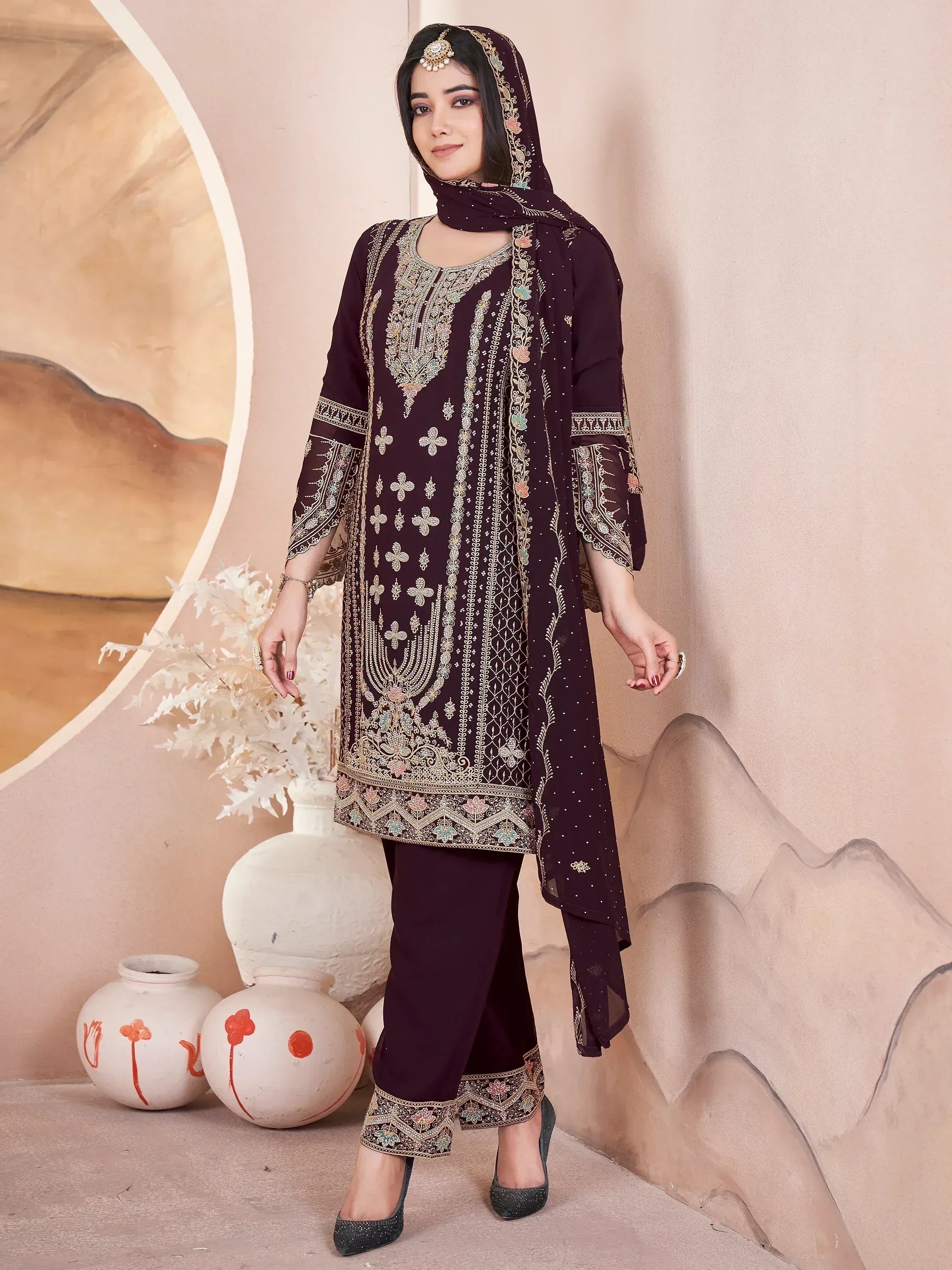 Elegant maroon embroidered salwar kameez with matching dupatta, perfect for Indian ethnic wear occasions.