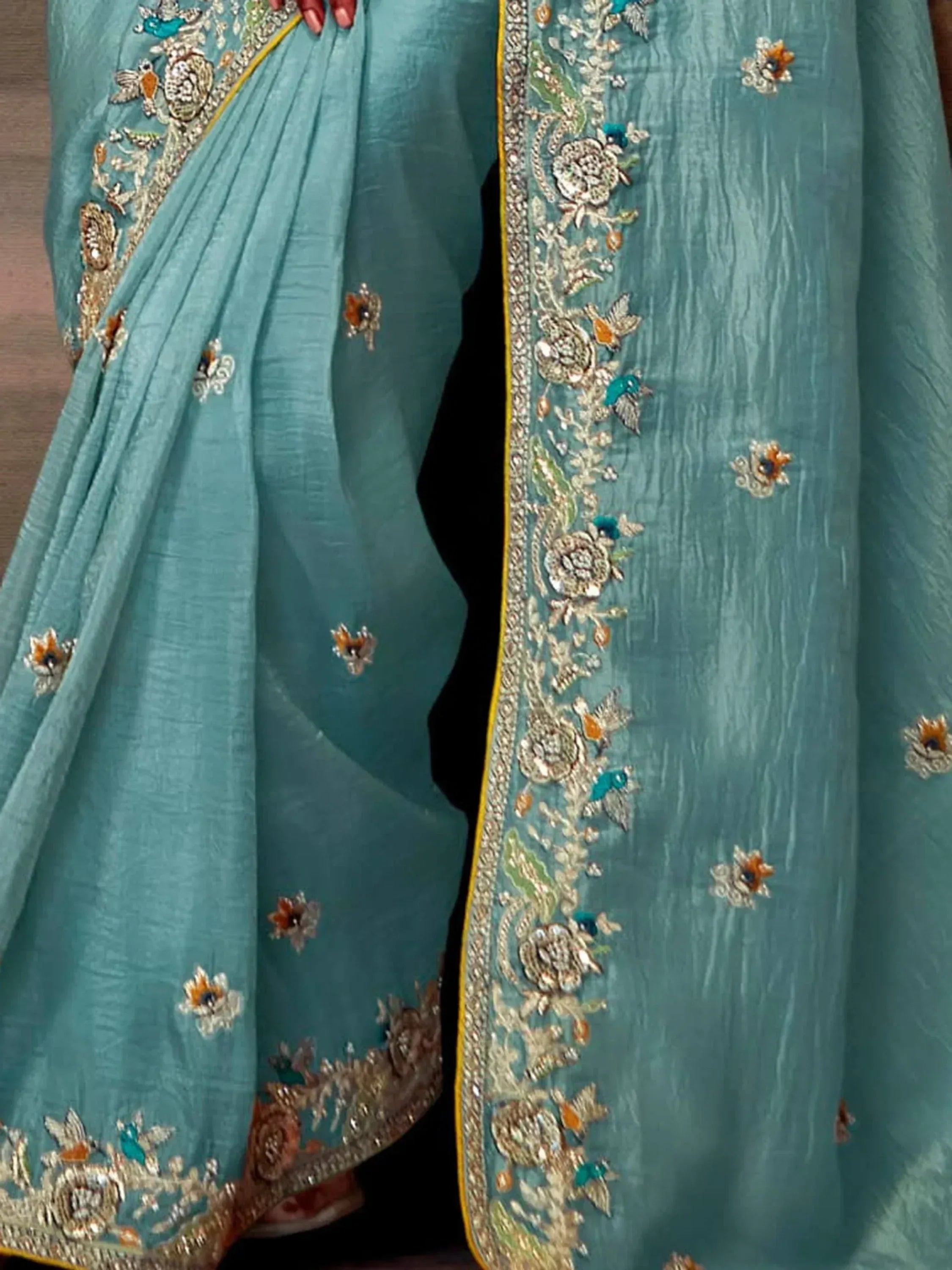 Teal designer saree with floral and bird embroidery, gold border, ethnic wear