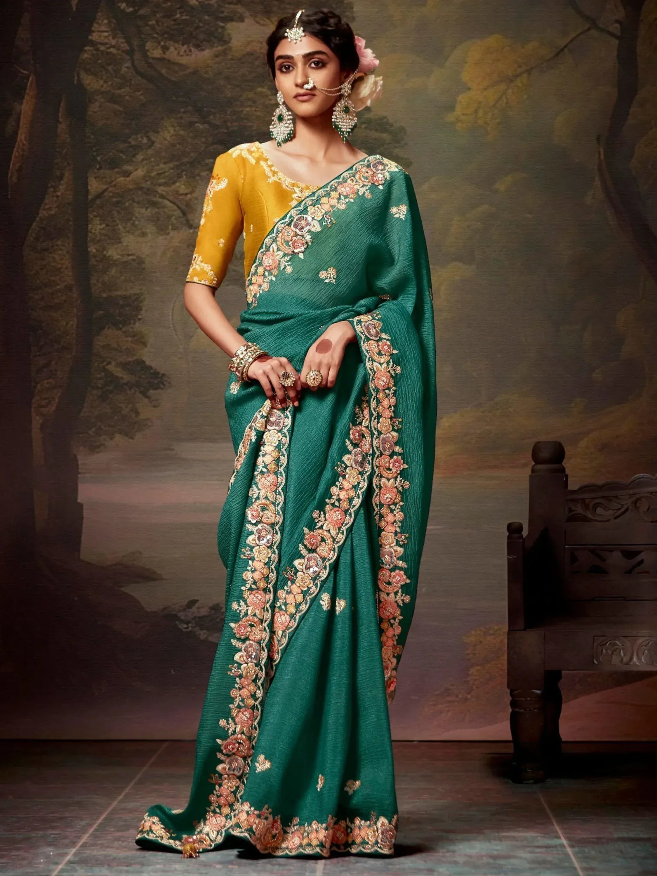 Emerald green embroidered saree with yellow blouse, floral border, traditional Indian ethnic wear