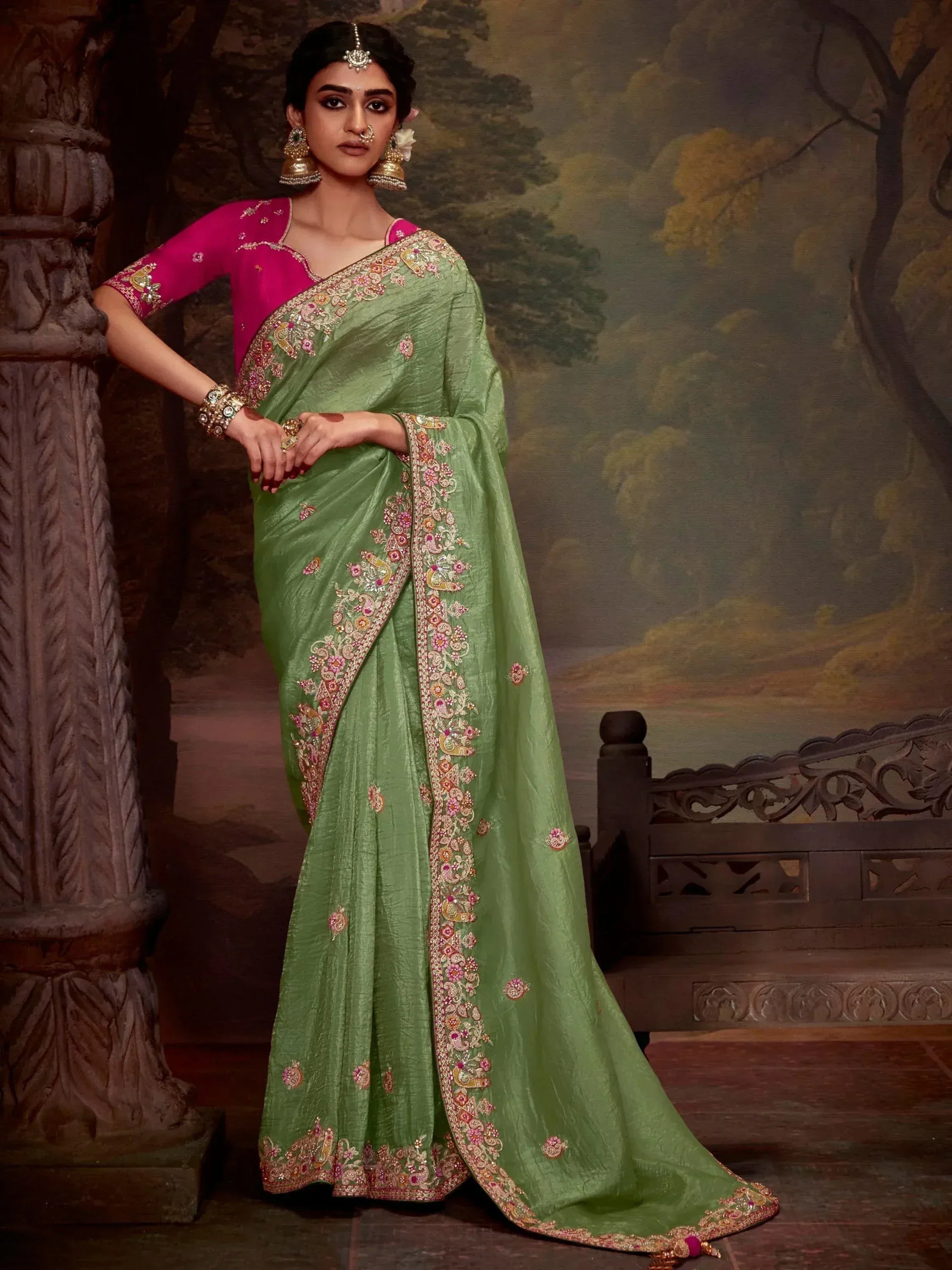 Green embroidered saree with pink blouse, traditional Indian ethnic wear for women