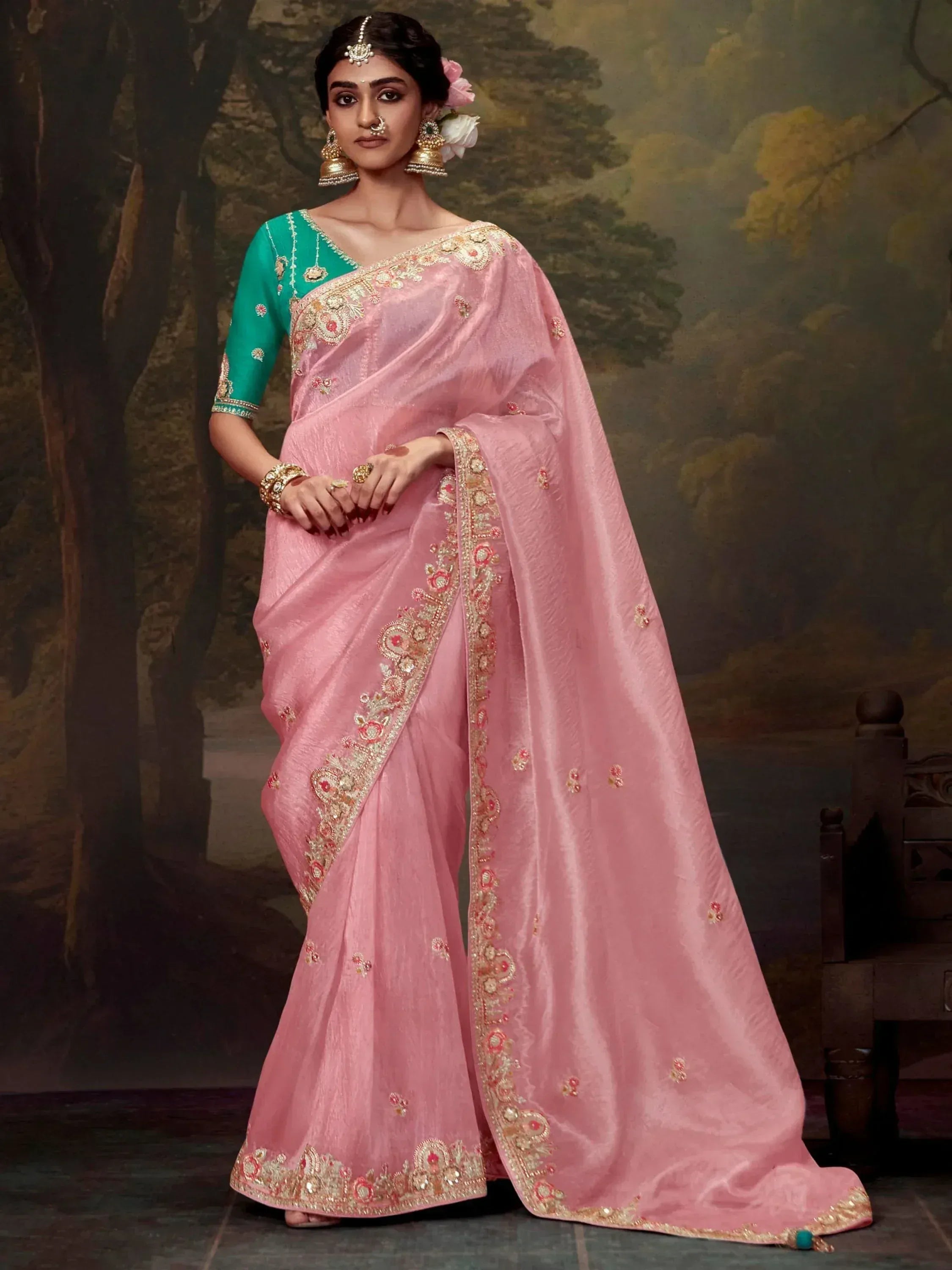 Pink embroidered saree with green blouse, traditional Indian ethnic wear for weddings and festivals