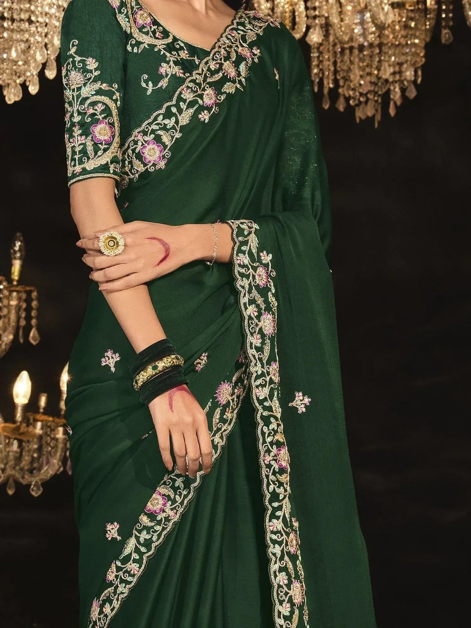 Emerald green saree with floral embroidery, perfect for Indian ethnic wear and festive occasions.