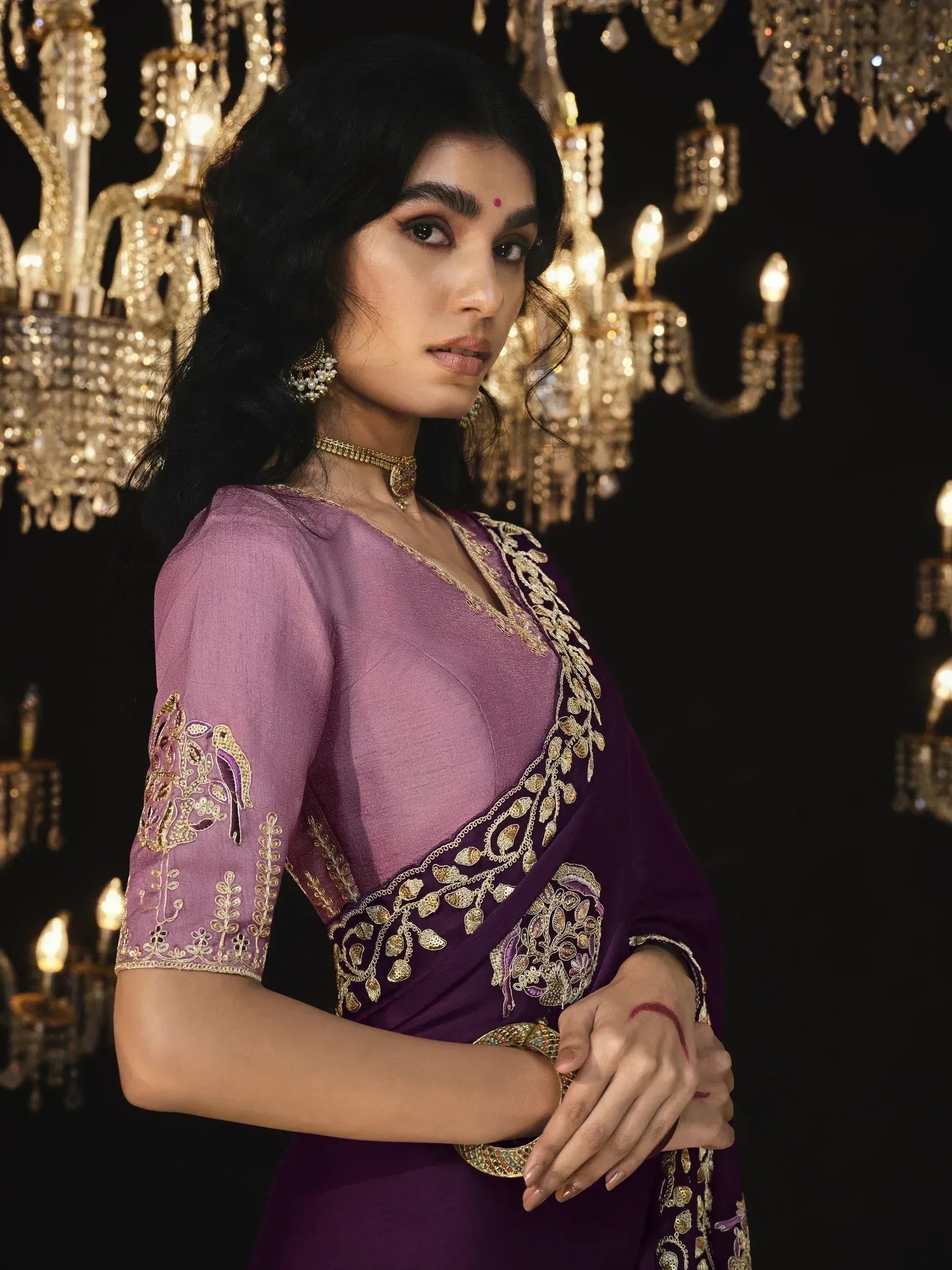 Elegant purple saree with gold embroidery, perfect for Indian ethnic wear and festive occasions.