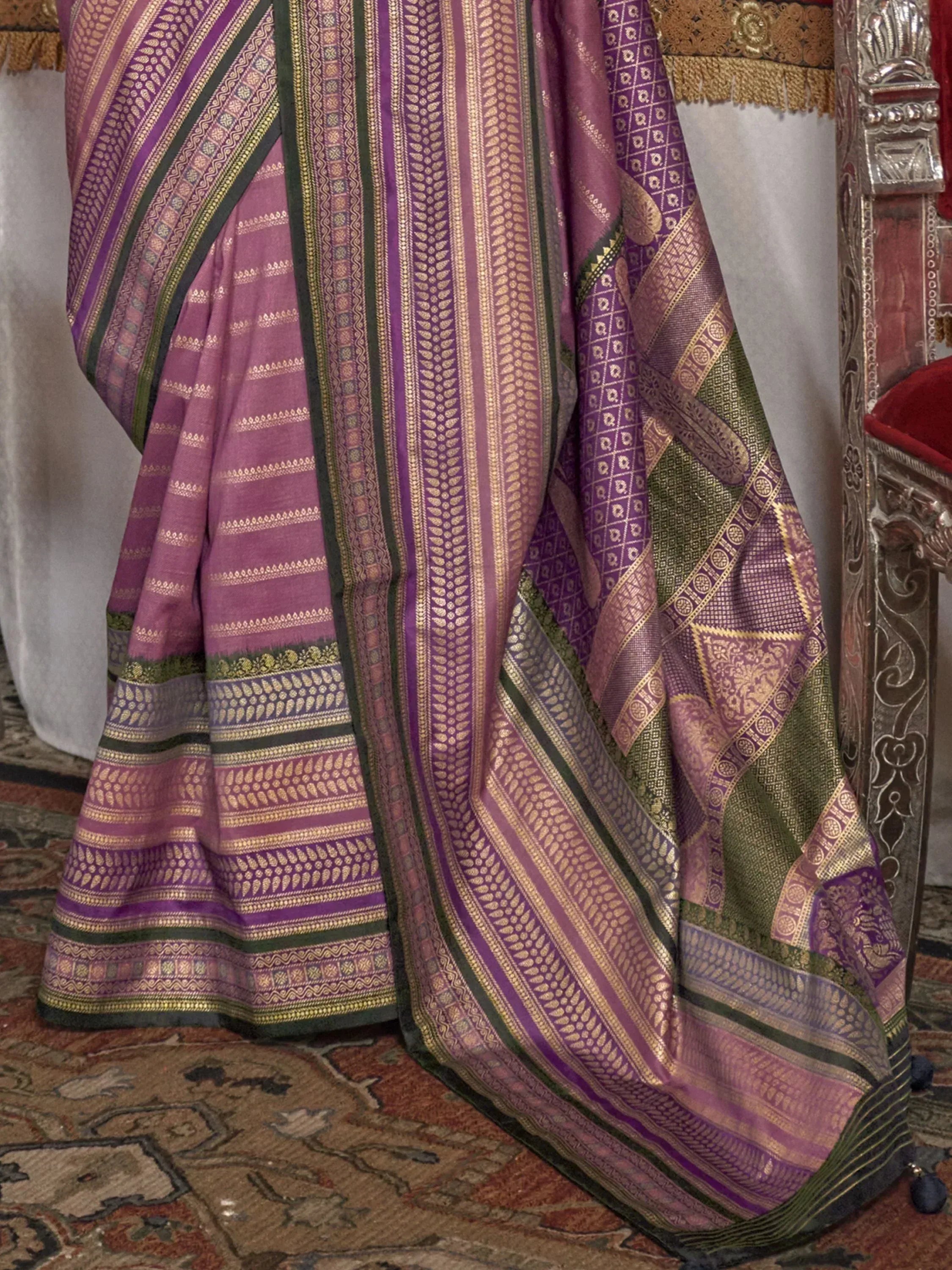Purple and green designer saree with intricate gold zari work, traditional Indian ethnic wear