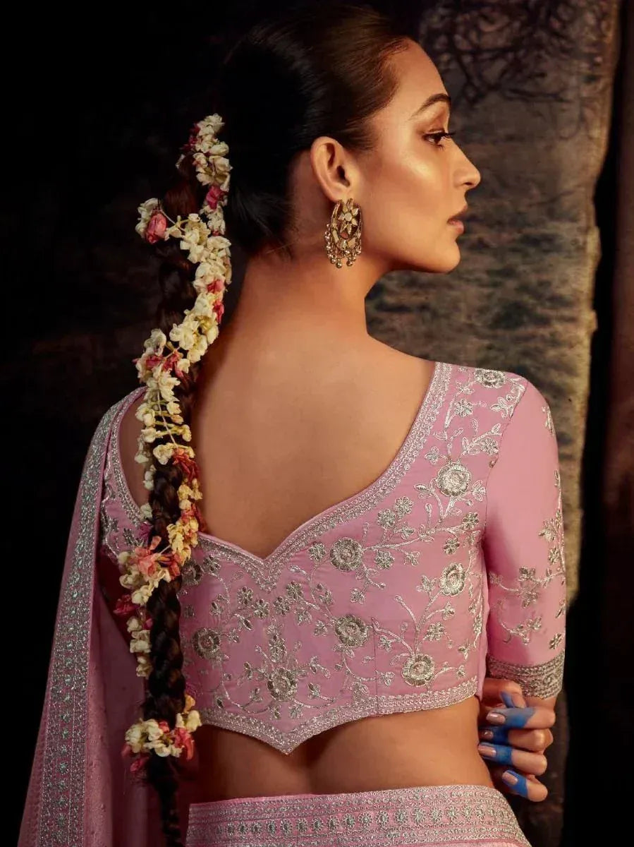 Pink embroidered lehenga choli with floral braid, perfect for Indian ethnic wear occasions
