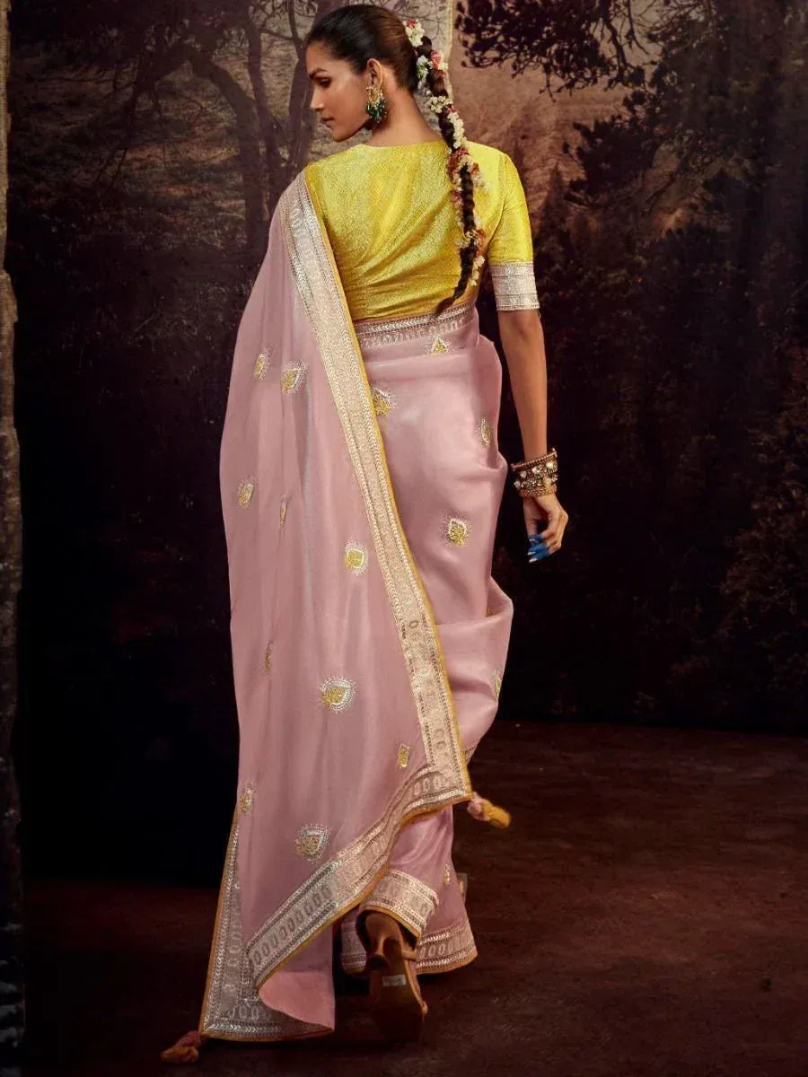 Pink embroidered saree with yellow blouse, perfect for Indian ethnic wear occasions