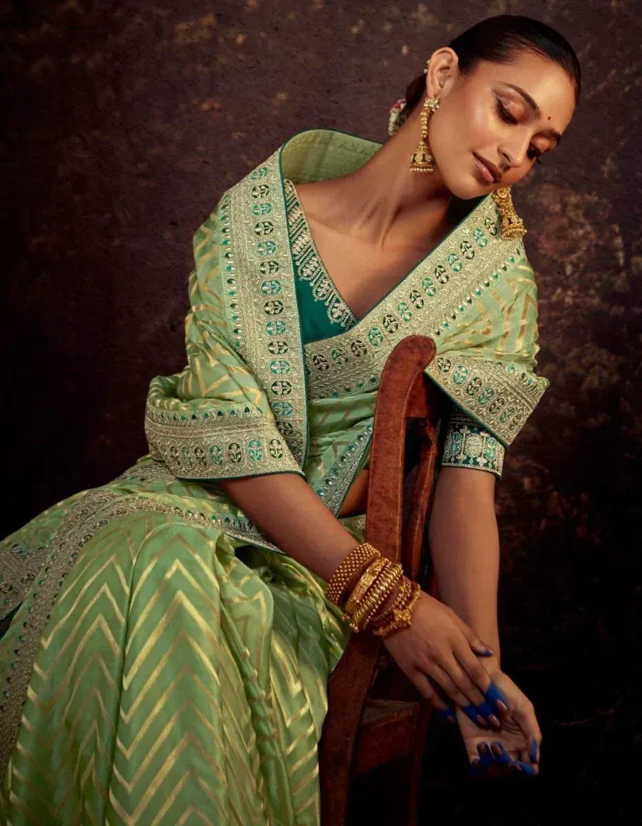 Elegant green designer lehenga choli with gold embroidery, perfect for Indian ethnic wear occasions