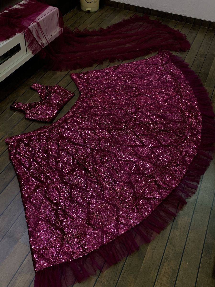 Sparkling maroon lehenga choli with sequins and tulle fringe, perfect for Indian ethnic wear events