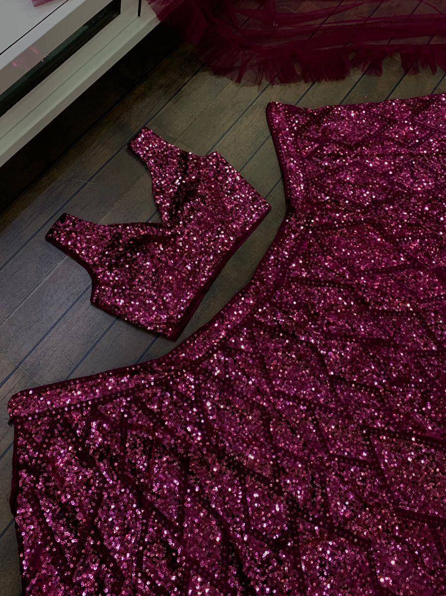 Sparkling maroon sequin lehenga choli set with layered skirt, perfect for Indian ethnic events and weddings