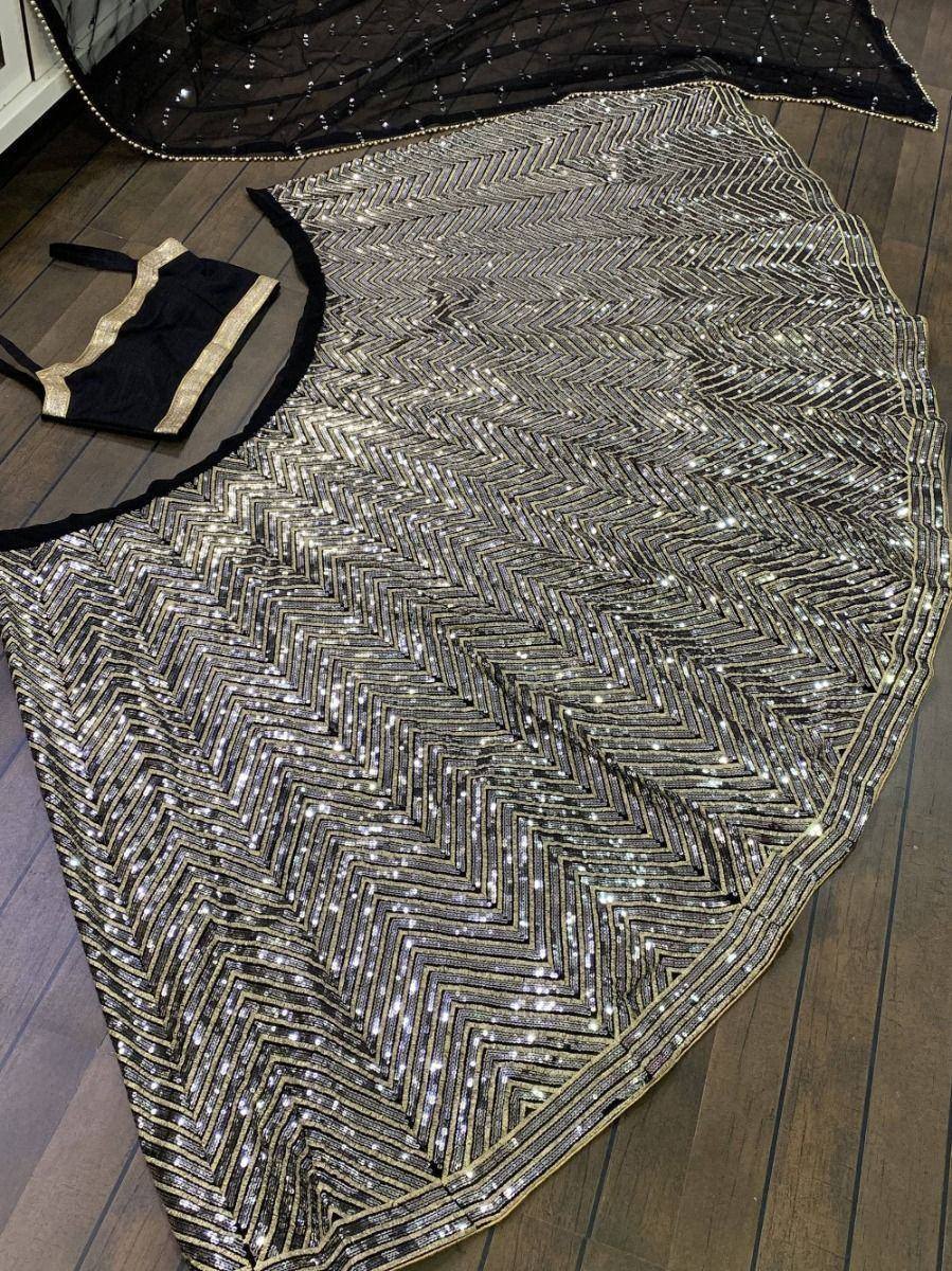 Black and gold sequin lehenga with zigzag pattern, designer ethnic wear for weddings