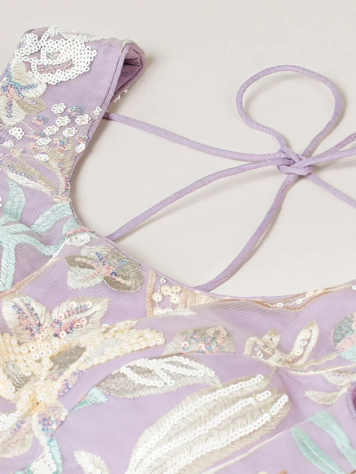 Lavender ethnic blouse with floral sequin embroidery and tie-back detail