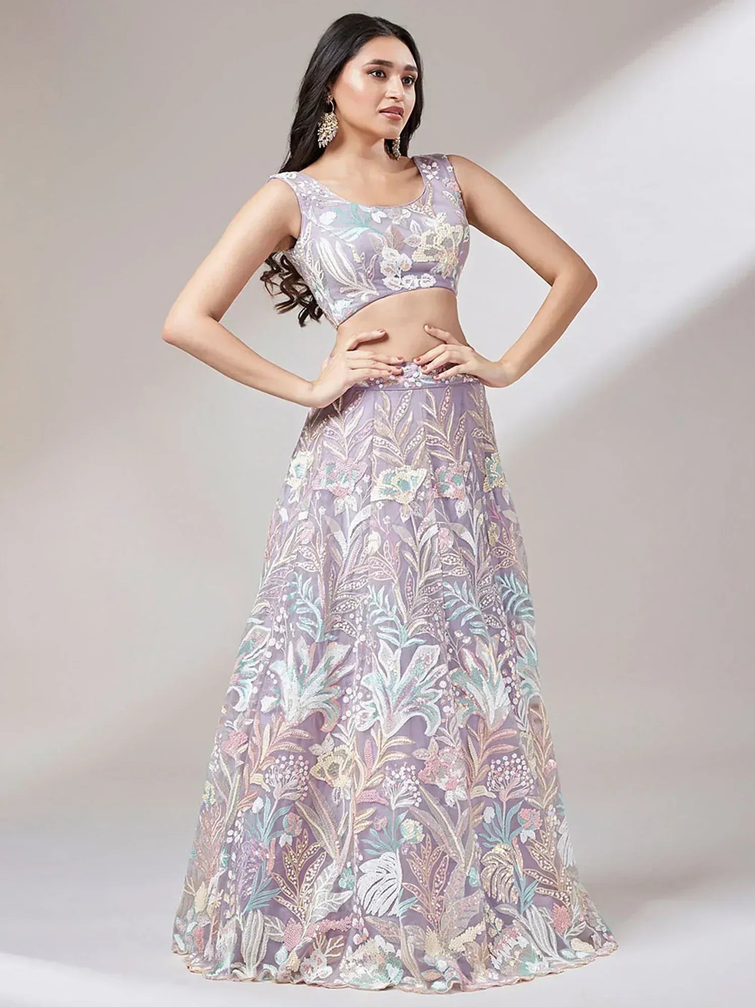 Lavender floral embroidered lehenga choli with sleeveless blouse, perfect for Indian ethnic occasions
