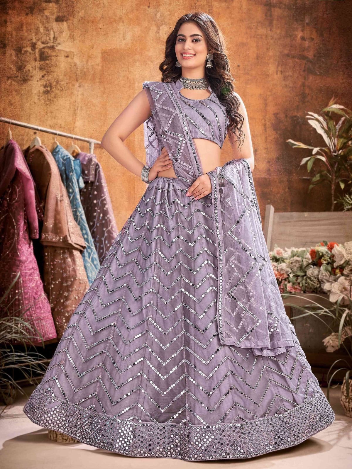 Lavender designer lehenga choli with sequin chevron patterns, perfect for Indian ethnic wear events.