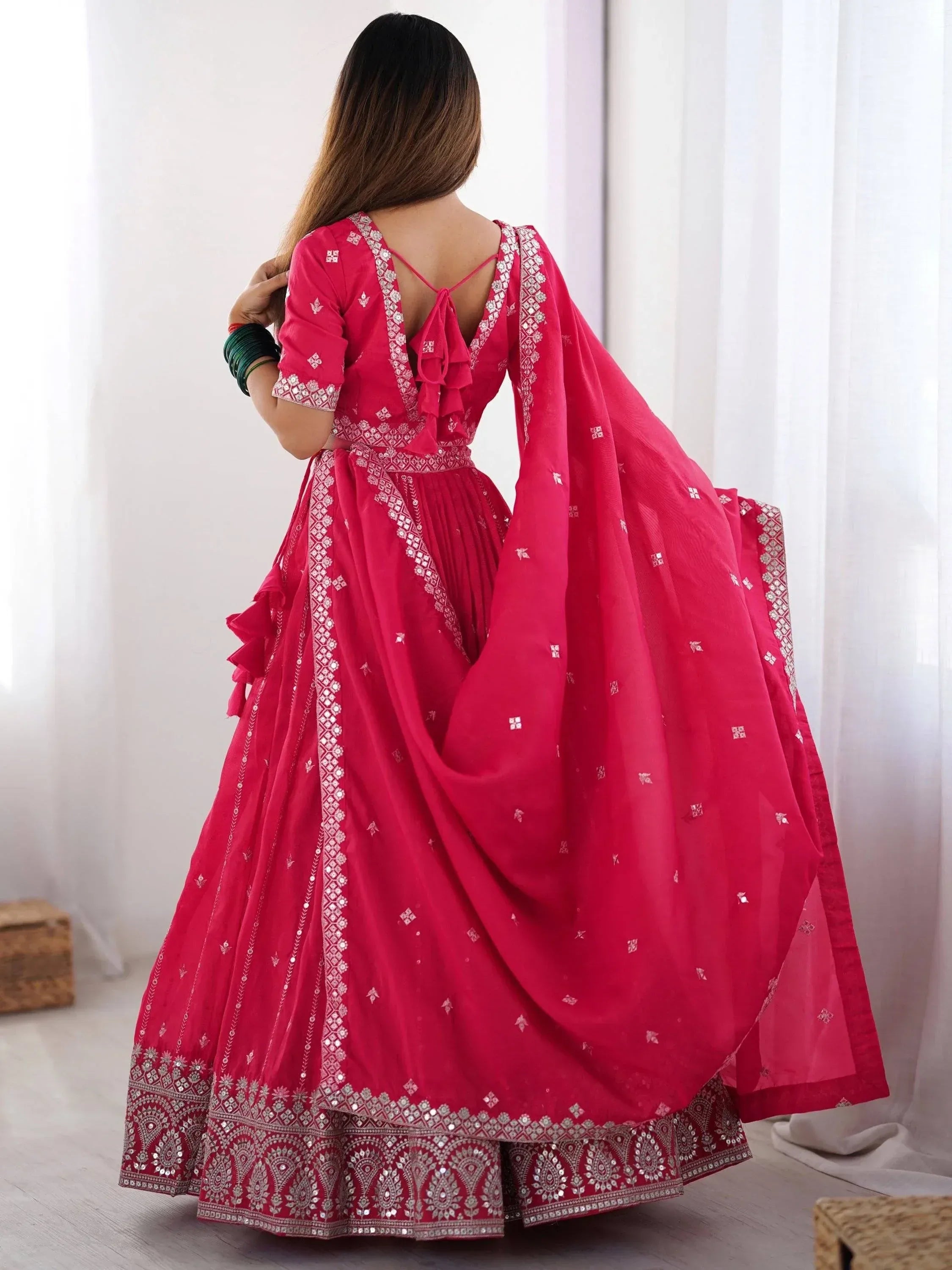 Pink designer lehenga choli with mirror work and ruffle back, ethnic Indian wear for women
