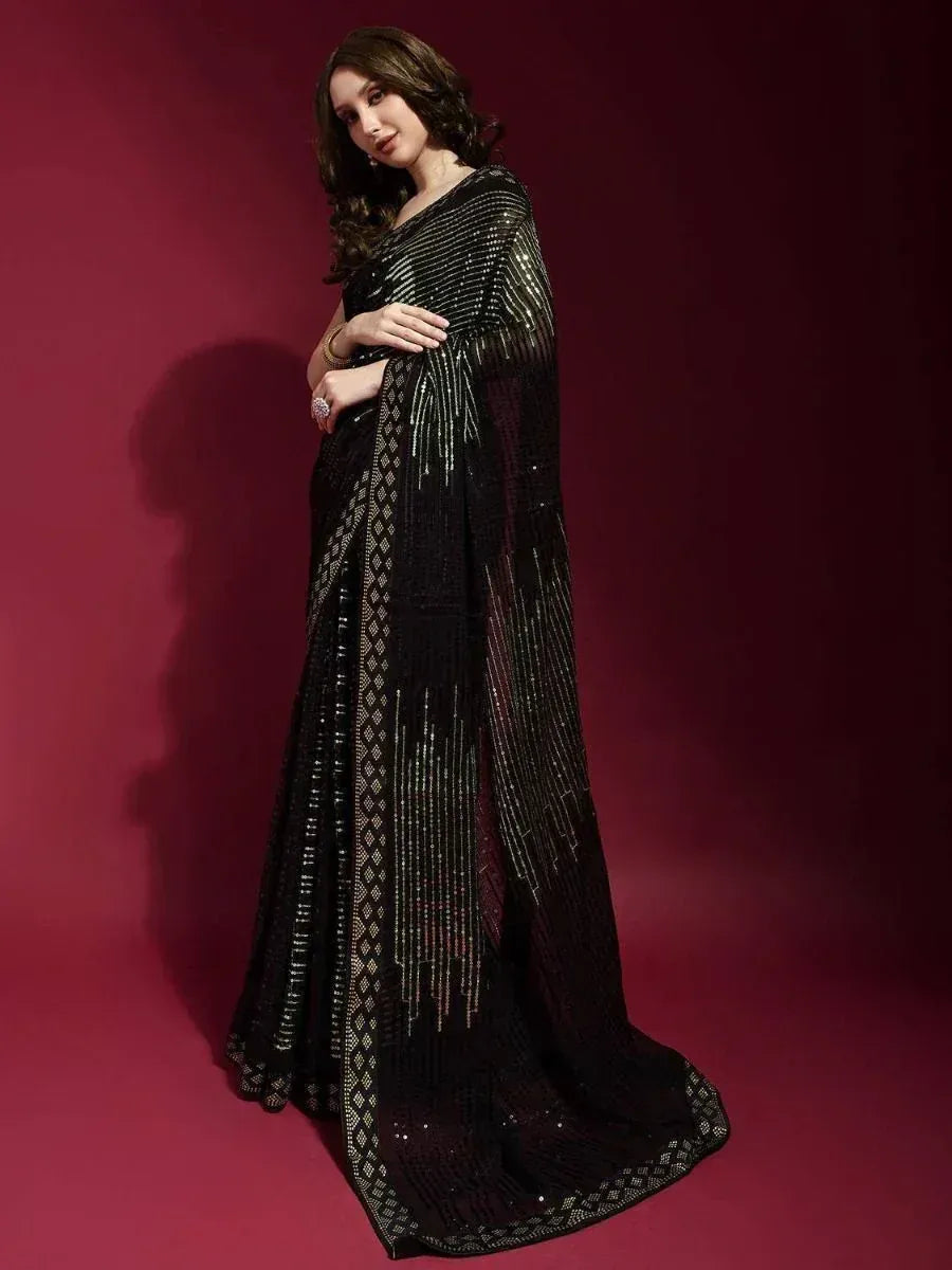 Black sequined saree with gold embroidery, elegant ethnic wear for women