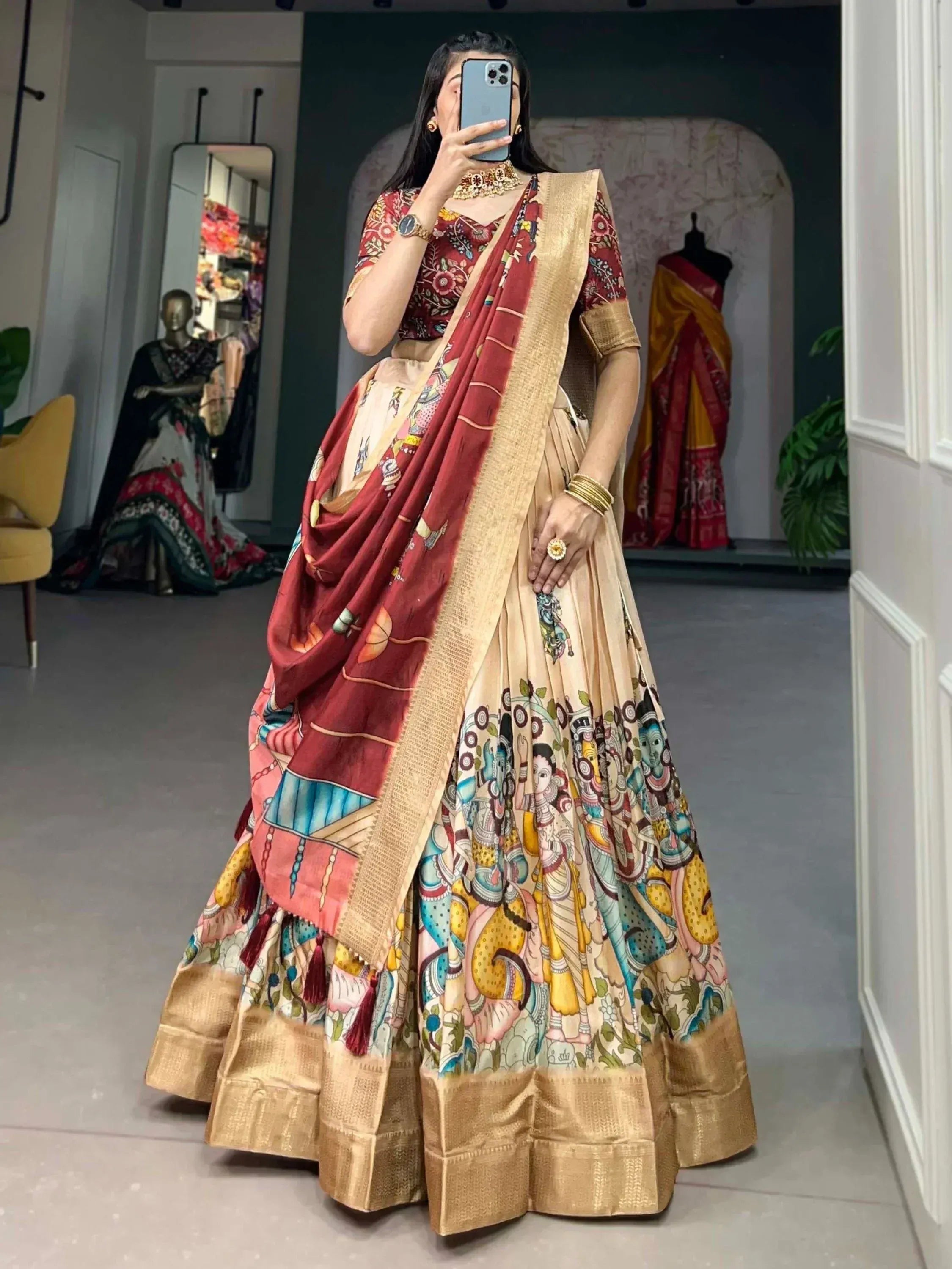 Woman in designer lehenga choli with colorful printed dupatta, ethnic wear for festive occasions