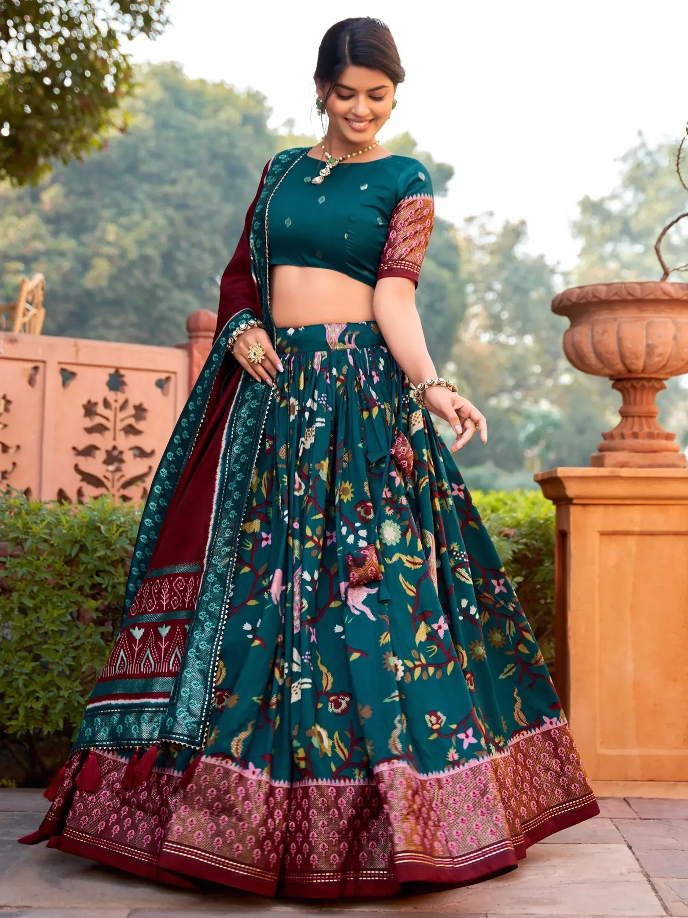 Teal floral lehenga choli with maroon dupatta, ethnic Indian wear for weddings and festivals
