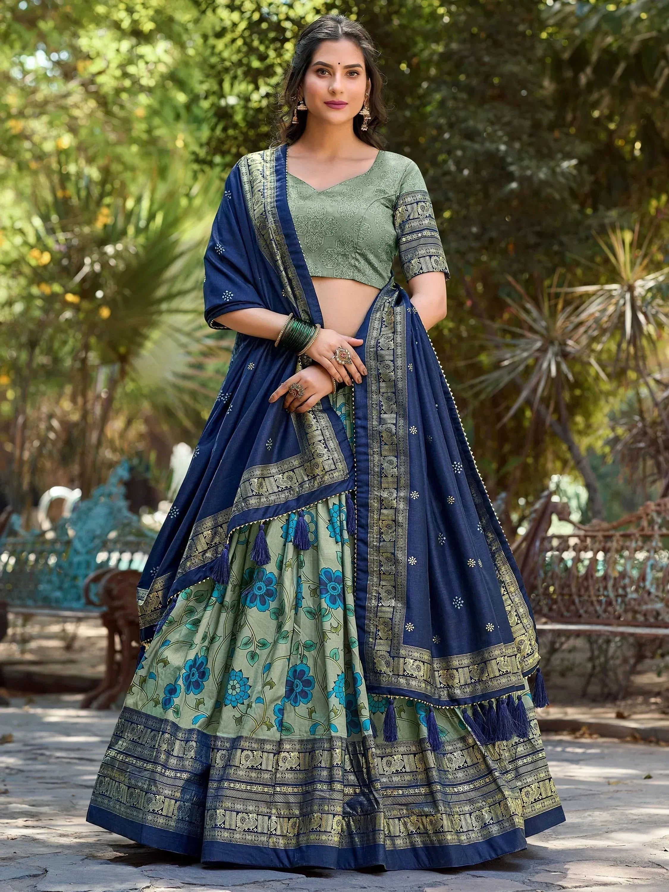 Blue and green floral lehenga choli with gold embroidery, perfect for Indian ethnic wear occasions