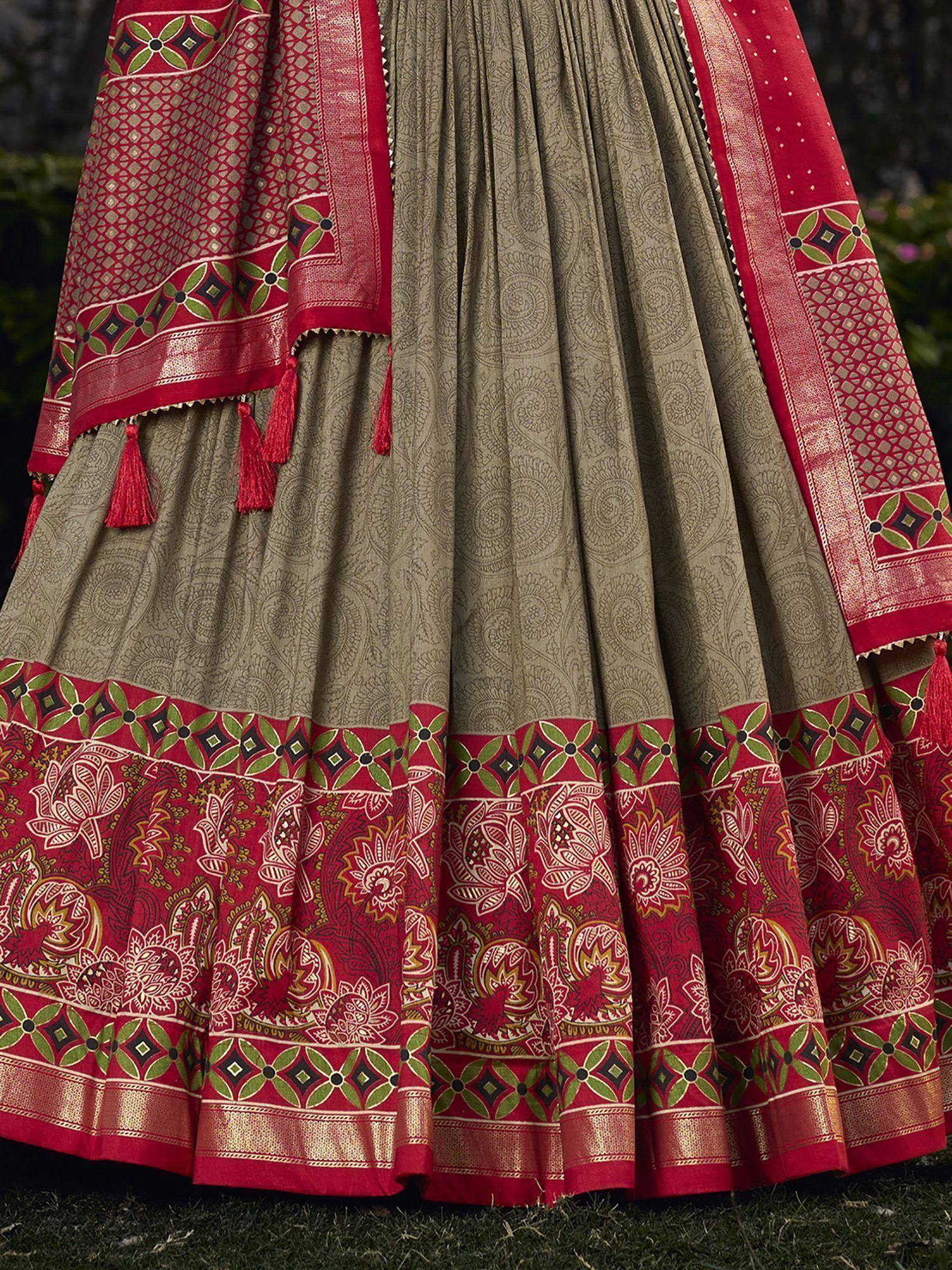 Olive green and red printed lehenga with floral border and tassels, ethnic Indian wear