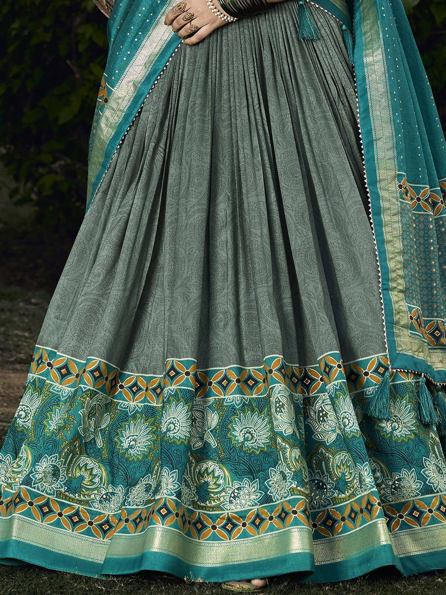 Teal and grey printed lehenga choli with floral border and dupatta, perfect for Indian ethnic wear