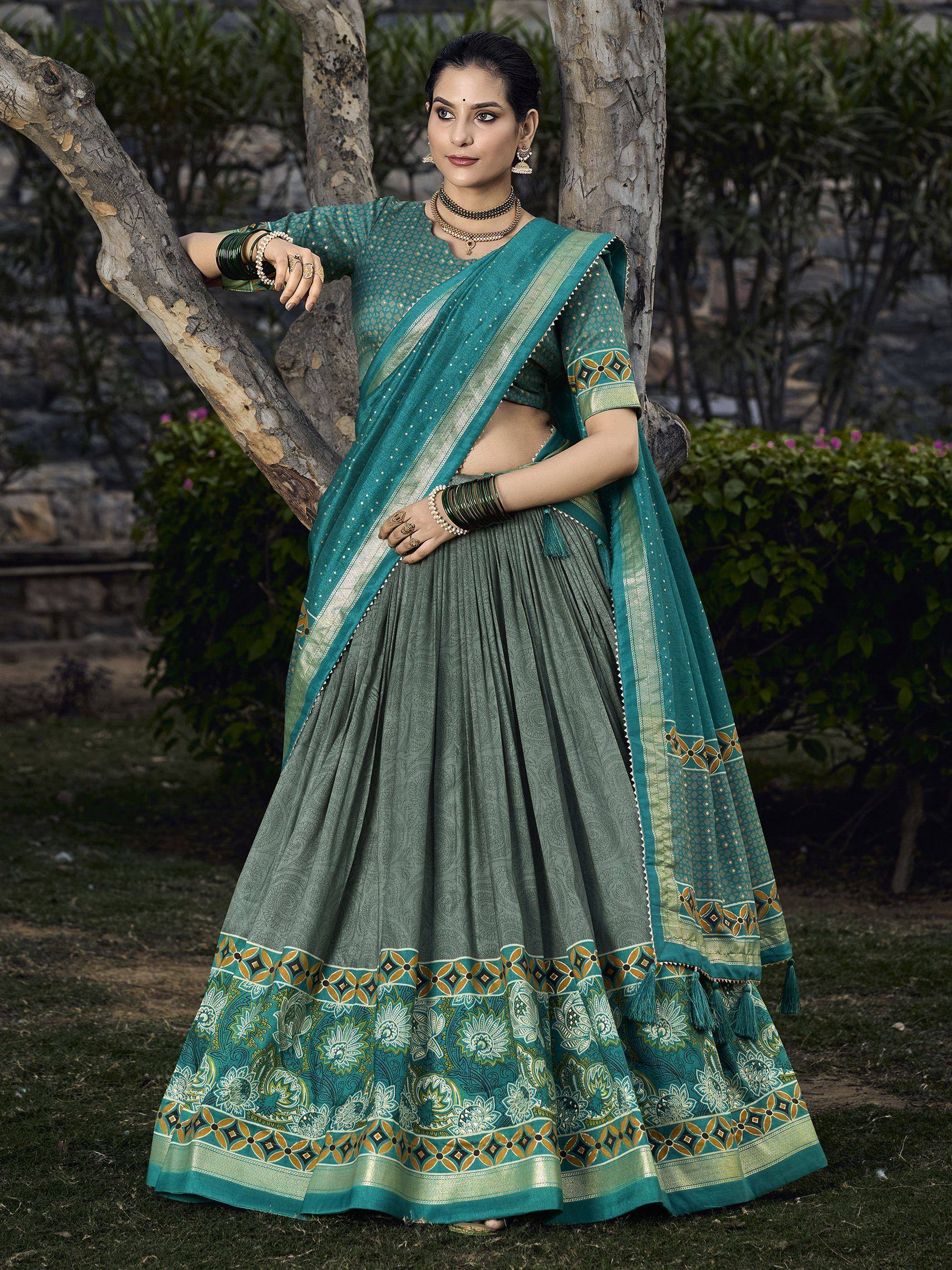 Teal and grey designer lehenga choli with floral border, perfect for Indian ethnic wear occasions
