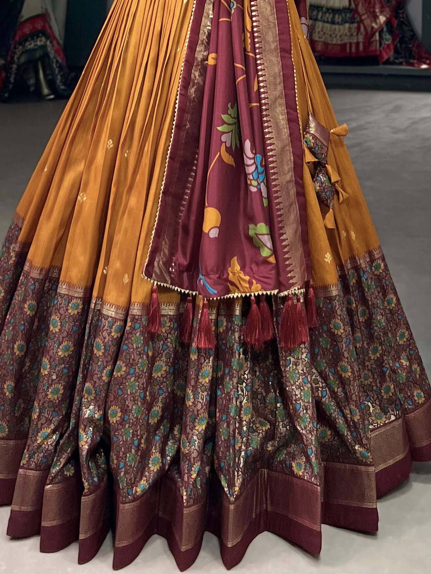 Mustard and maroon designer lehenga choli with floral print and tassels, ethnic Indian wear