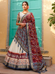 Magnetic White & Maroon Patola Printed Silk Navratri Wear Lehenga Choli