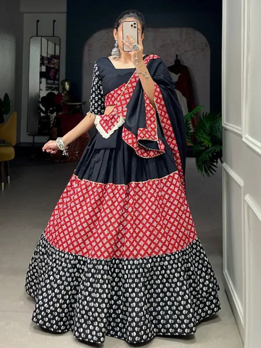 Black and red printed lehenga choli with floral patterns, perfect for Indian ethnic wear occasions