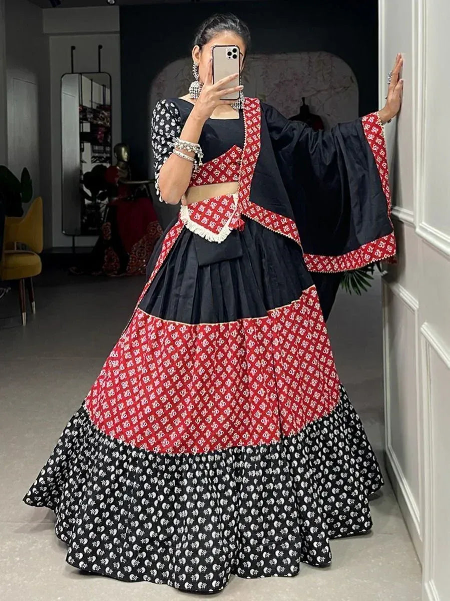 Black and red printed lehenga choli with flared skirt, perfect for Indian ethnic wear occasions