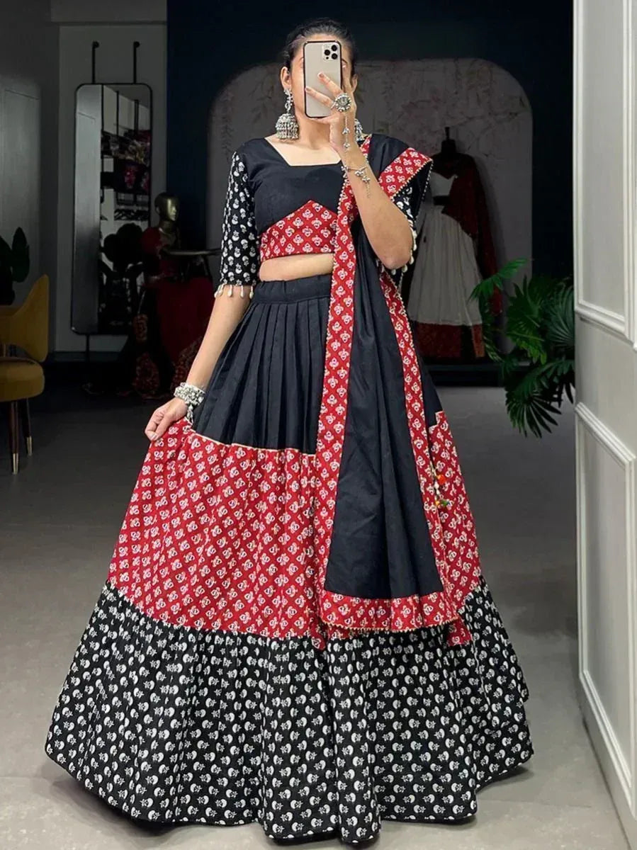 Black and red printed lehenga choli with floral patterns, perfect for Indian ethnic occasions