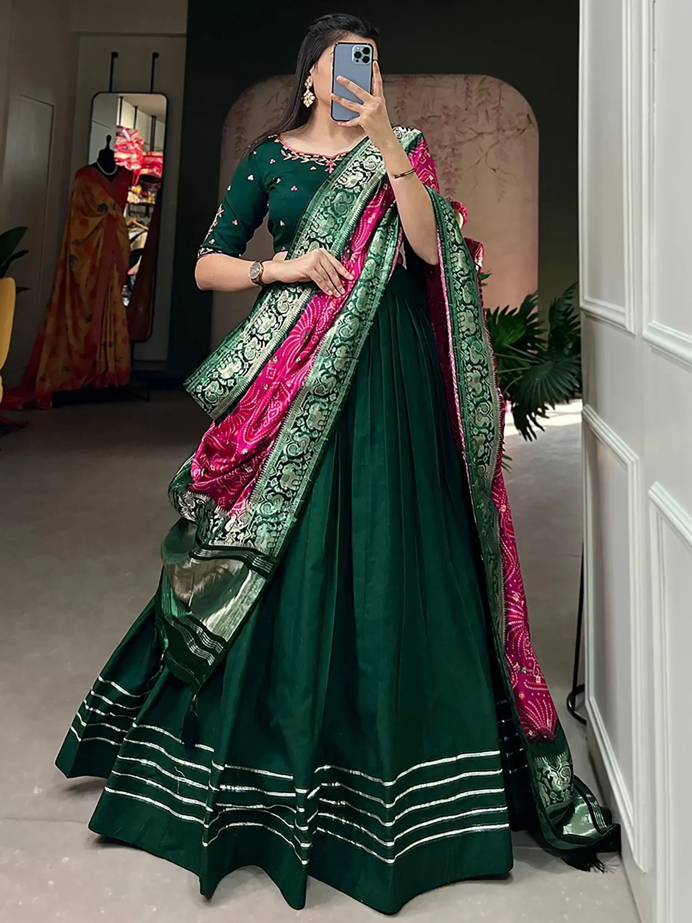 Emerald green lehenga choli with pink dupatta, ethnic Indian wear for women