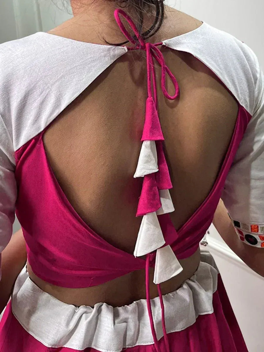 Pink and white ethnic crop top with back tie and tassels, perfect for lehenga choli or party wear