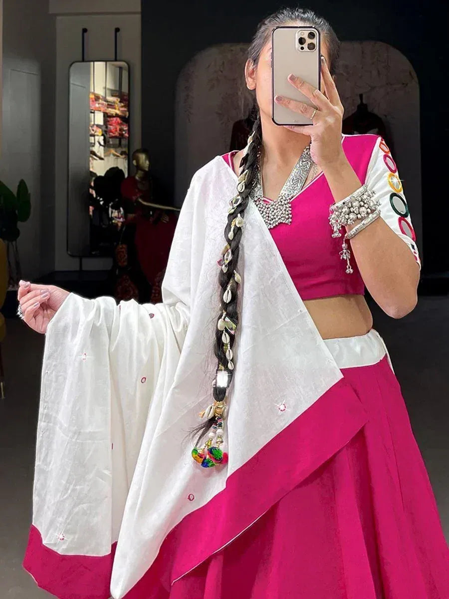 Woman in pink lehenga choli with white dupatta, ethnic Indian wear, mirror selfie