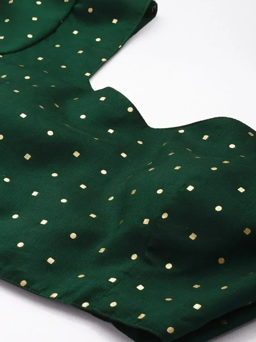 Emerald green ethnic blouse with gold dot print, scalloped neckline, perfect for lehenga or saree