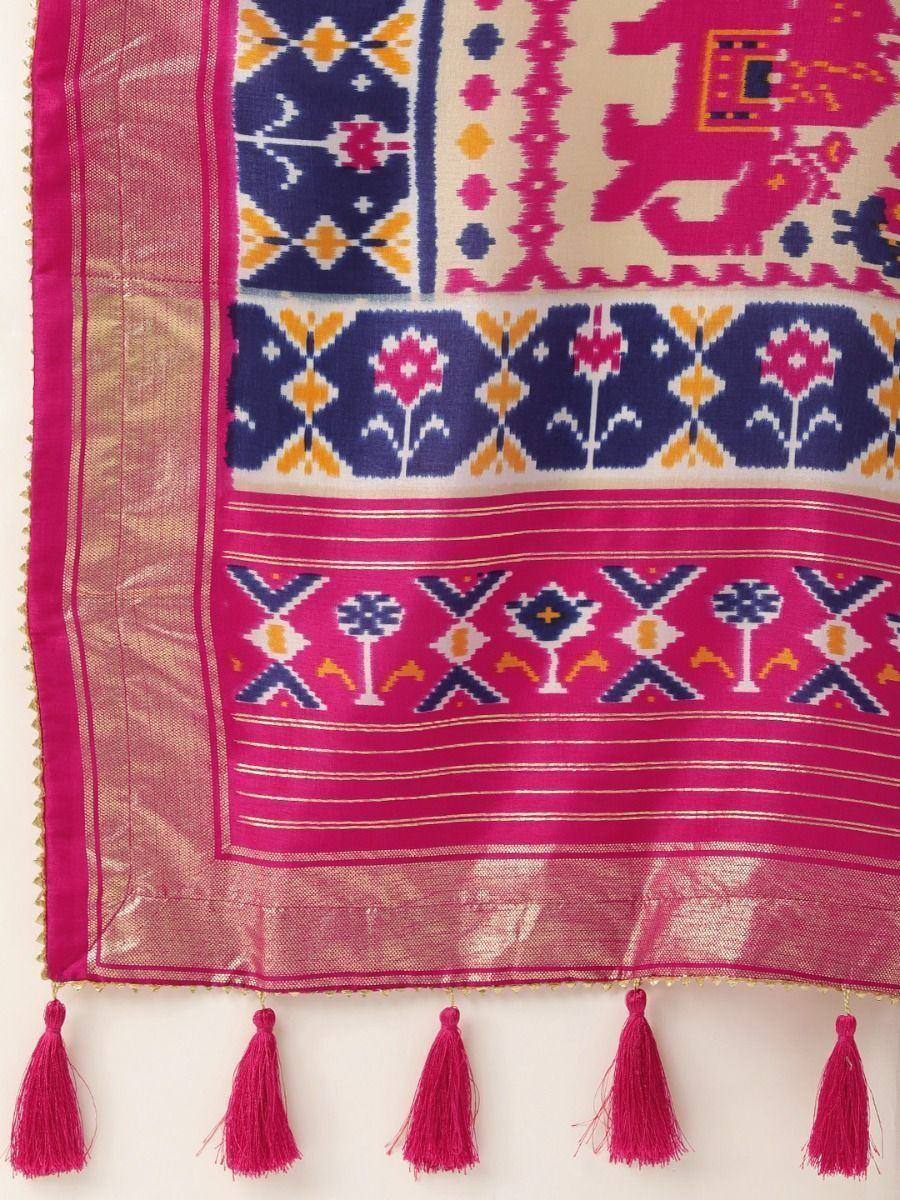 Vibrant pink and navy ikat saree with tassels, floral motifs, and ethnic border design
