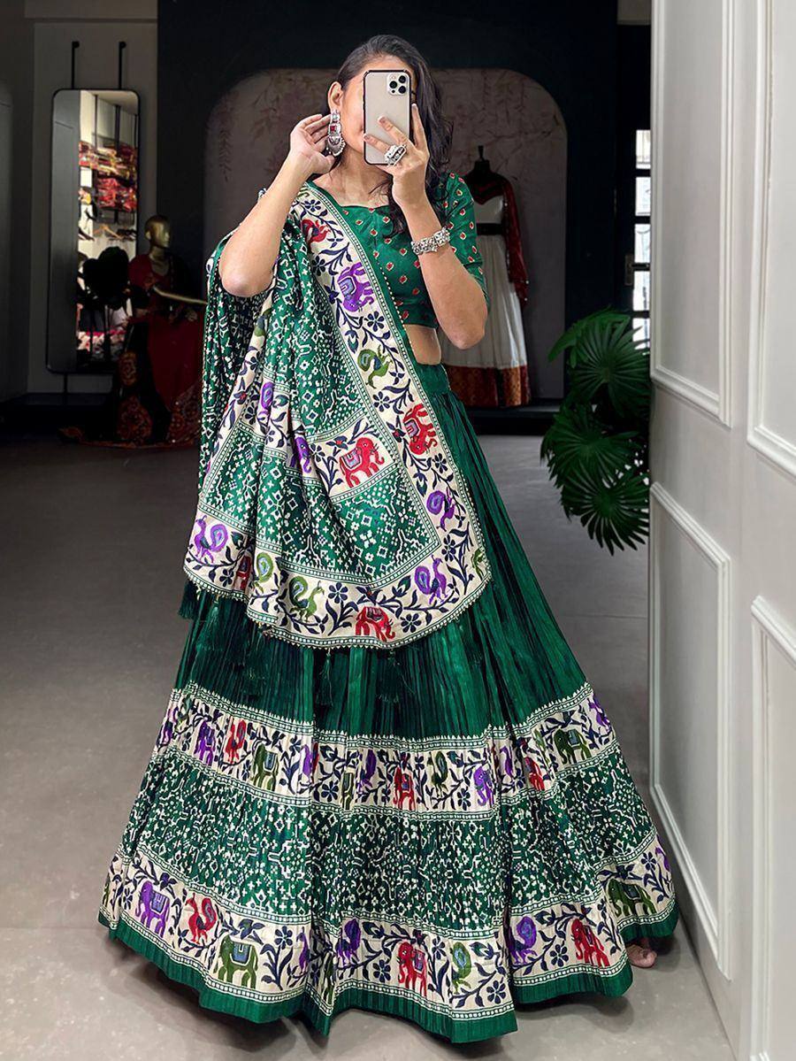 Green printed lehenga choli with elephant motifs, ethnic Indian wear for women