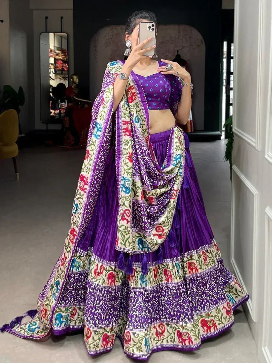 Purple designer lehenga choli with elephant print dupatta, ethnic Indian wear for weddings and festivals