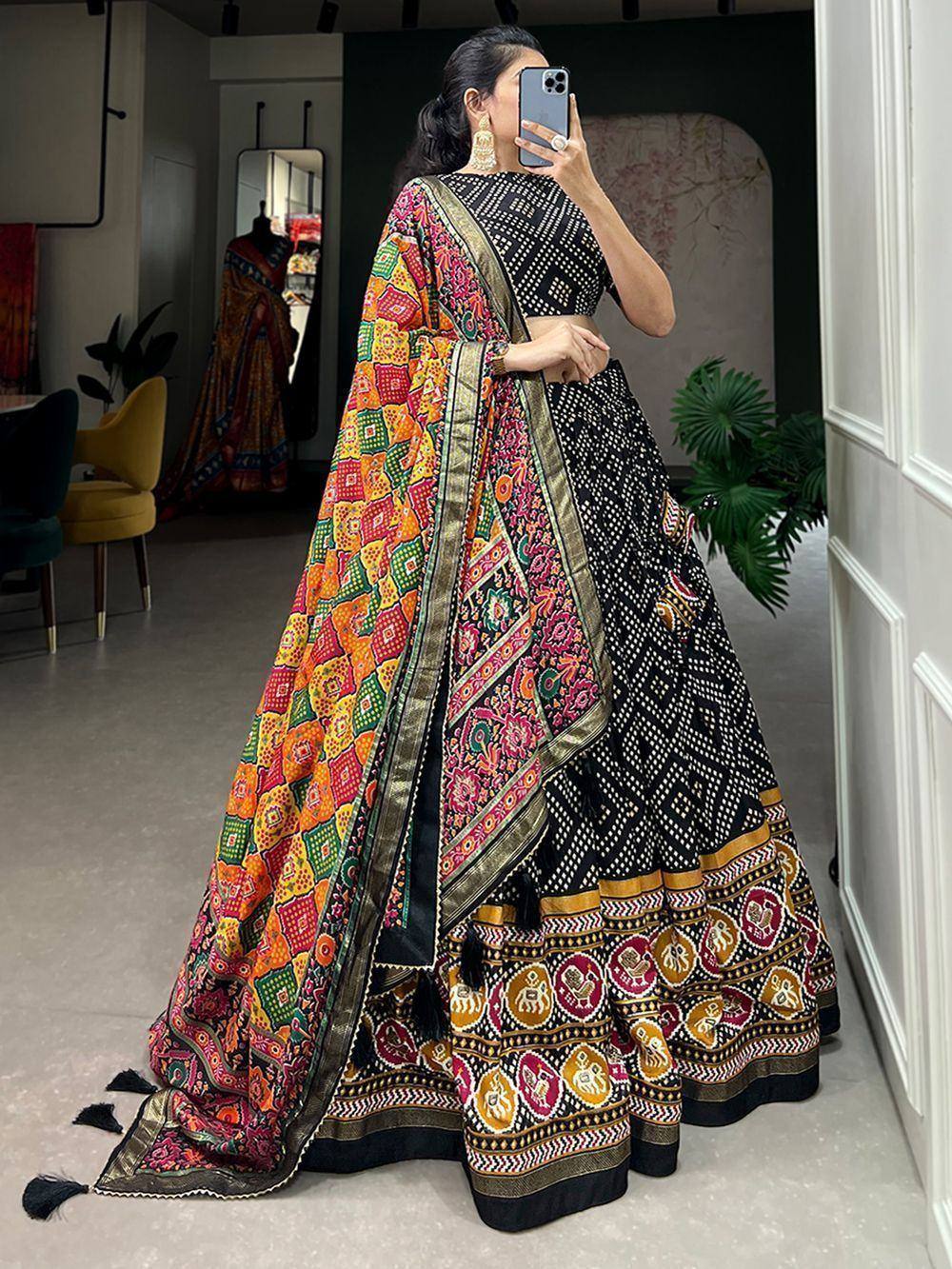 Black printed lehenga choli with colorful embroidered dupatta, ethnic Indian wear for women
