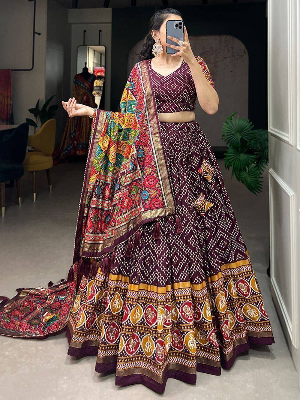 Maroon printed lehenga choli with colorful dupatta, ethnic Indian wear for weddings and festivals