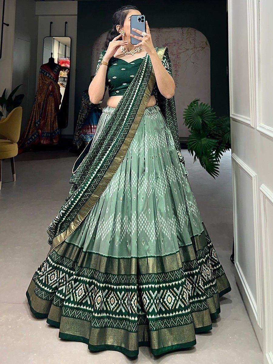 Green printed lehenga choli with geometric border, ethnic wear for women