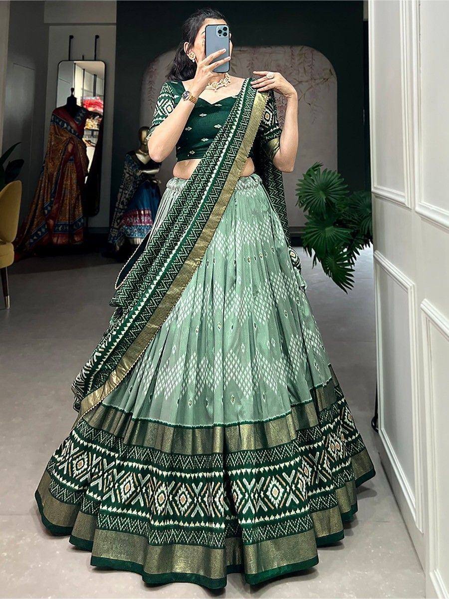 Green printed lehenga choli with geometric border, ethnic wear for women