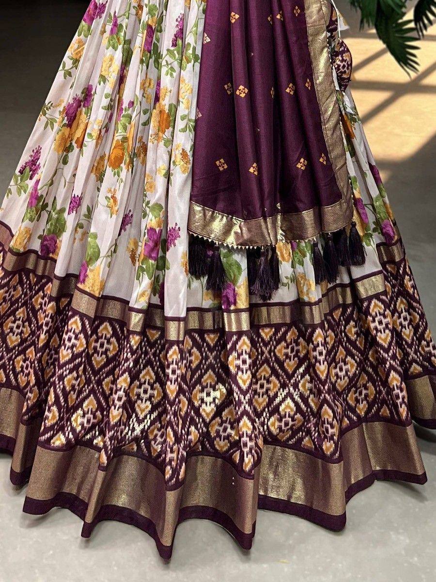 Floral and geometric print lehenga choli with gold border and tassels, Indian ethnic wear