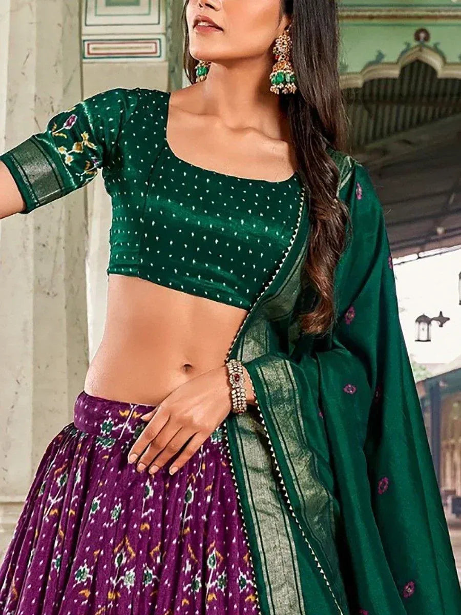 Green velvet blouse with white dots, purple printed lehenga, and matching dupatta for Indian ethnic wear