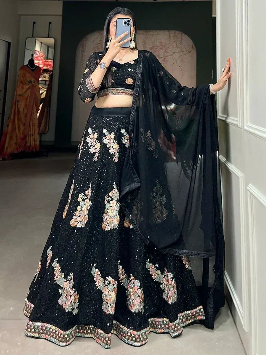 Black floral embroidered lehenga choli with sheer dupatta, ethnic Indian wear for weddings and events