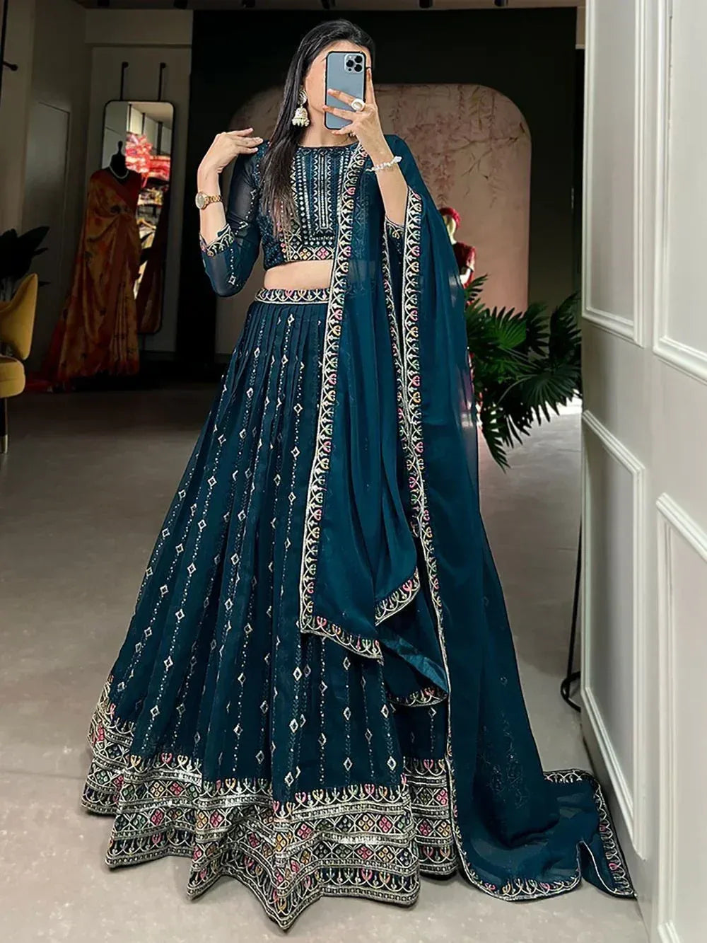 Teal embroidered lehenga choli with sheer dupatta, Indian ethnic wear for weddings and festivals