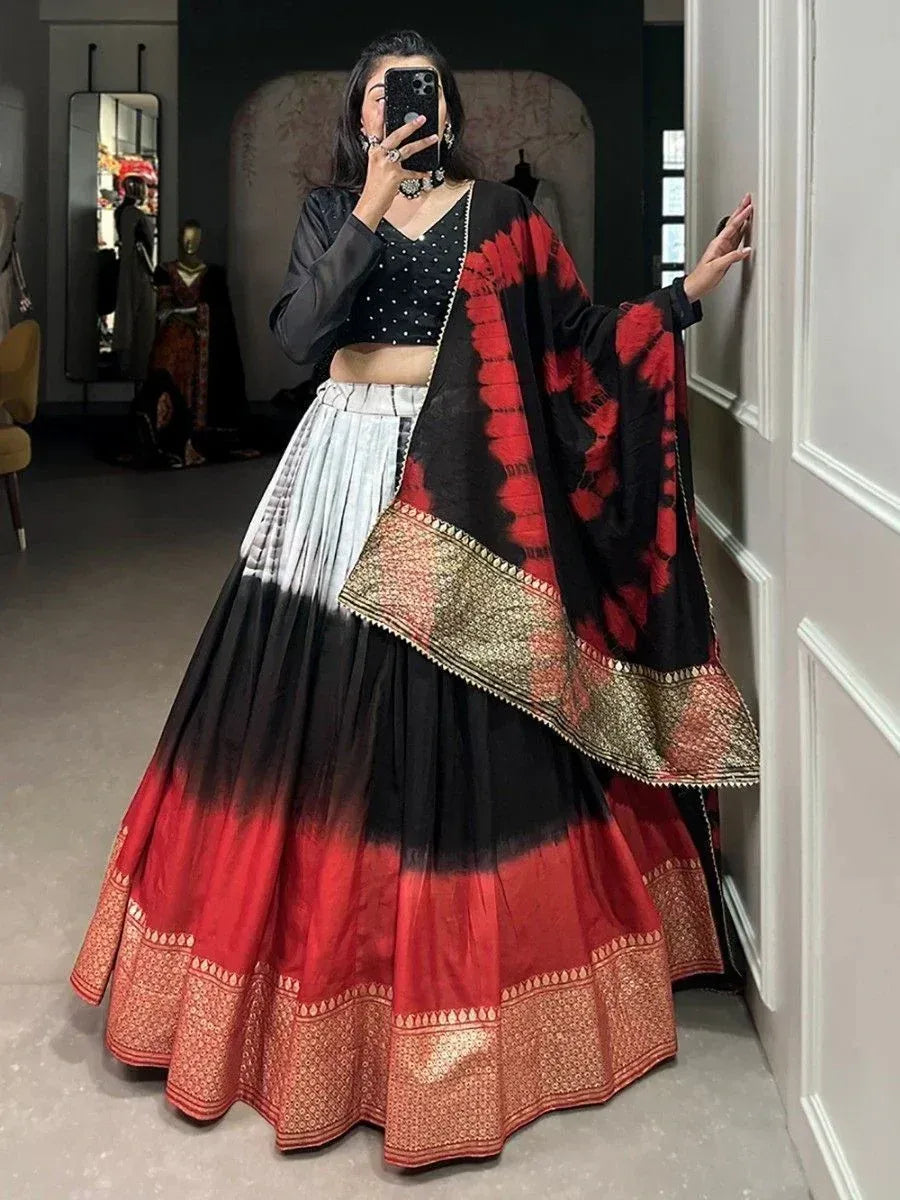 Black and red tie-dye lehenga choli with gold border, ethnic wear for women
